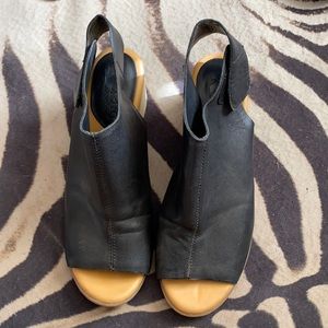 Black leather mules